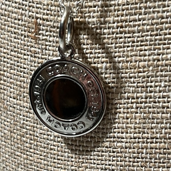 COACH CHARM ON A 18” STERLING SILVER NECKLACE
STAMPED 925 - Picture 1 of 4